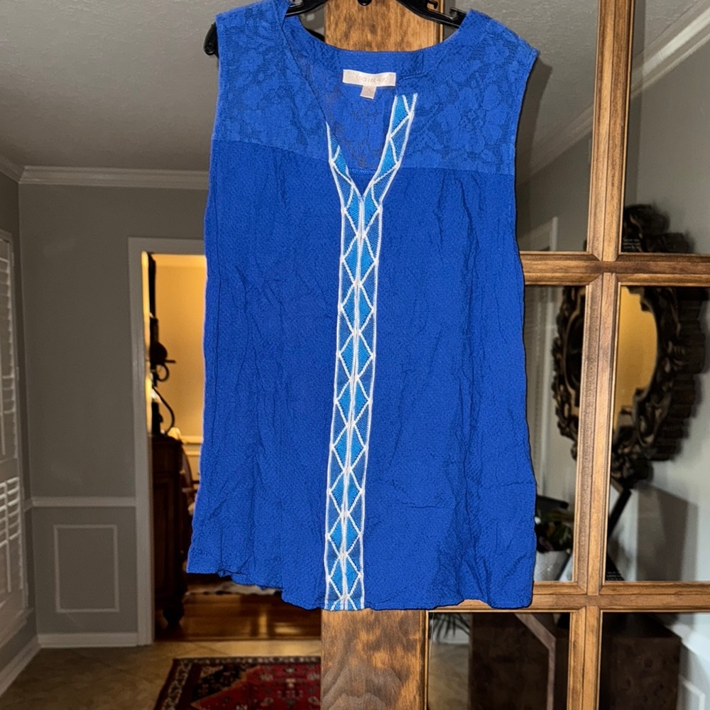 Vibrant Blue Sleeveless Blouse with Textured Design